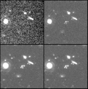 A section of the HDF about 14 arcseconds across in each of the four wavelengths used to construct the final version: 300 nm (top left), 450 nm (top right), 606 nm (bottom left) and 814 nm (bottom right)