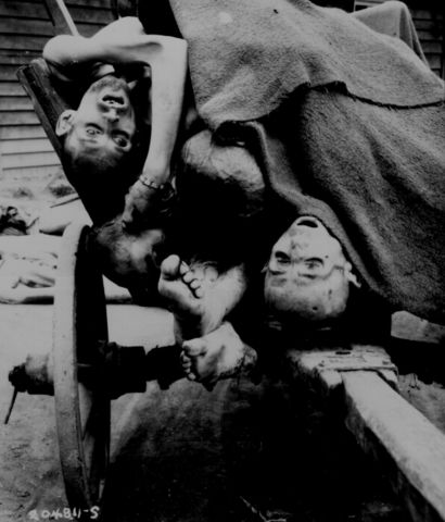 Image:Some of the bodies being removed by German civilians for decent burial at Gusen Concentration Camp, Muhlhausen, near Linz, Austria.jpg