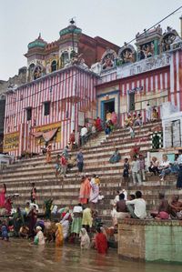 People performing Hindu ceremony at one of the ghats of Varanasi