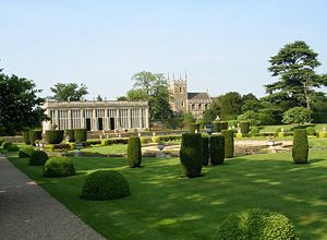 The "Italian garden", Orangery and Church.  The Orangery and "Italian garden" were designed by Jeffry Wyatville in the early 19th century.  The church contains the tombs of the Brownlow and Cust owners of Belton House.