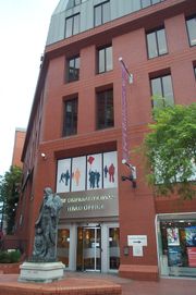 The Co-operative Bank's head office, 1 Balloon Street, Manchester.  The statue in front is of Robert Owen, a pioneer in the cooperative movement.