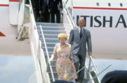 Queen Elizabeth II and Prince Philip disembark Concorde.