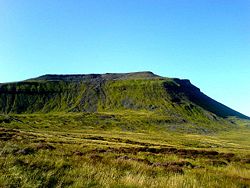 The whole of Ingleborough as seen from the peat bog below