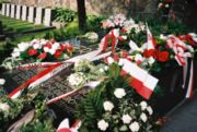 Grave of Piłsudski's mother in Vilnius, Lithuania. The huge black tombstone is inscribed: "Matka i serce syna" ("A mother and the heart of her son") and bears evocative lines from a poem by Słowacki.