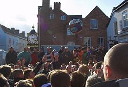 The ball is hit into the air at the 2006 Royal Shrovetide Football match. (Photographer: Gary Austin.)