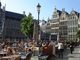 Grote Markt  (main square): open air cafés, City Hall and guildhouses in background.