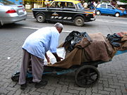 Ice being transported by cart in Mumbai, India