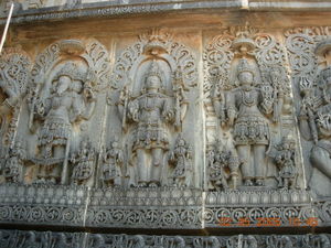 An art depiction of the Trimurti in Hoysaleswara temple