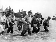 Douglas MacArthur lands at the Battle of Leyte, by U.S. Army Signal Corps