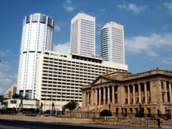 The skyline of the Fort area. The twin towers of the World Trade Center building are in the background, with the Bank of Ceylon tower to their left and the Presidential Secretariat in the foreground.