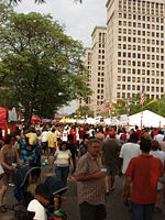 CityFest in the New Center with Cadillac Place in the background.
